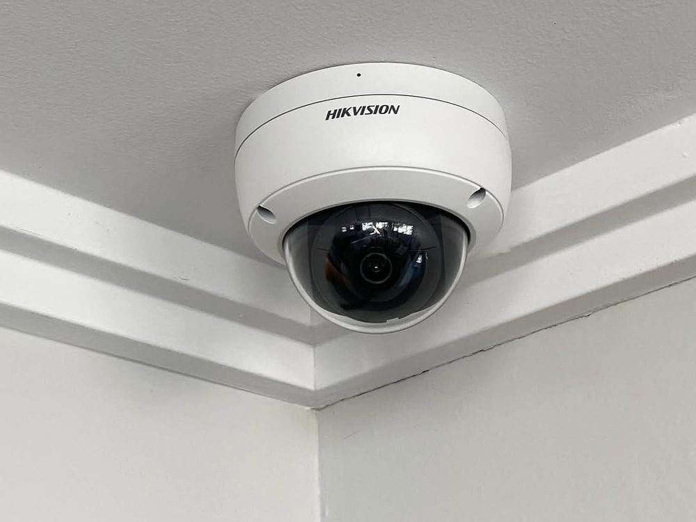 Dome CCTV camera on a ceiling corner